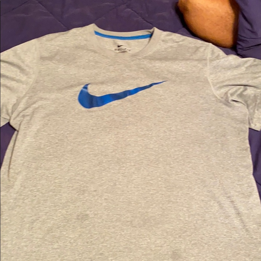 Blue Nike swoosh tee